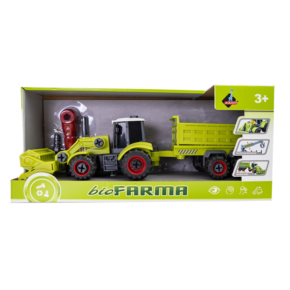 Traktor z łyżką i przyczepą do skręcania